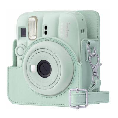 Cámara instantánea Fujifilm Instax Mini 13 color verde menta con funda y correa para llevar. Ideal para fotografía divertida.