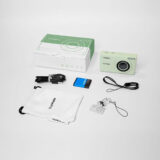 Yashica DigiMate cámara compacta verde, incluye cable, batería y accesorios, ideal para fotografía casual.