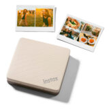 Impresora de fotos Instax, modelo mini Link, con impresiones de fotos retro y diseño compacto y moderno.