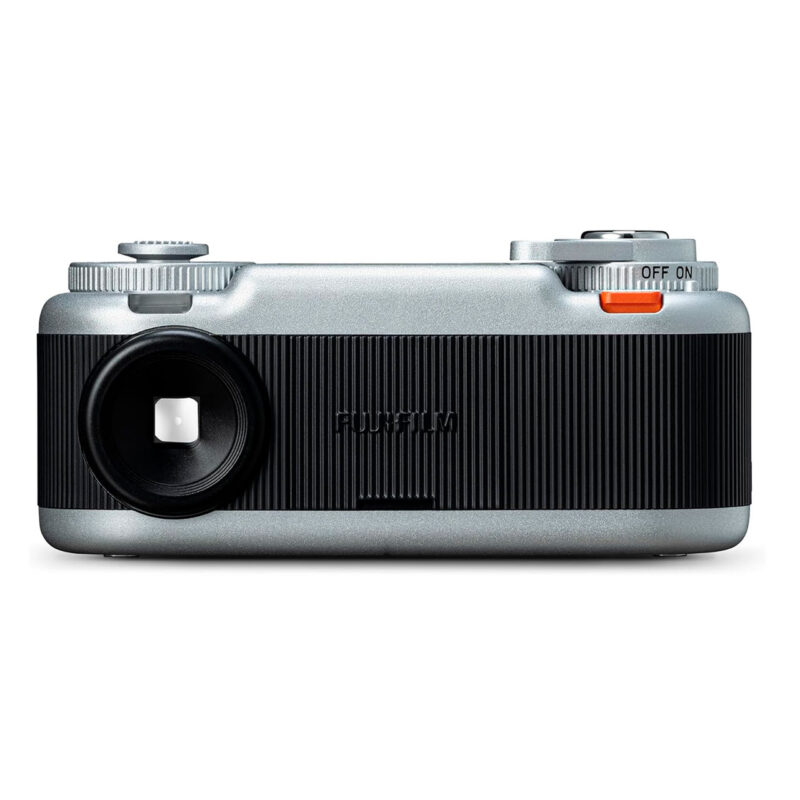 fuj170518-2-180 Cámara instantánea Fujifilm Instax Mini 11, diseño compacto en plata con lente y controles simples para fácil uso.