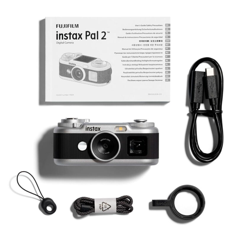 fuj170518-9-bee Cámara digital Fujifilm Instax Pal 2 con guía, cable USB y accesorios para fotografía instantánea.
